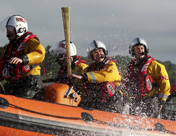 Olympic torch relay continues across Wales