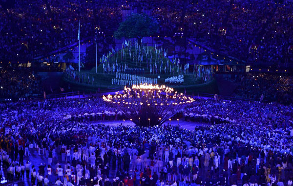 Seven teenagers light Olympic cauldron