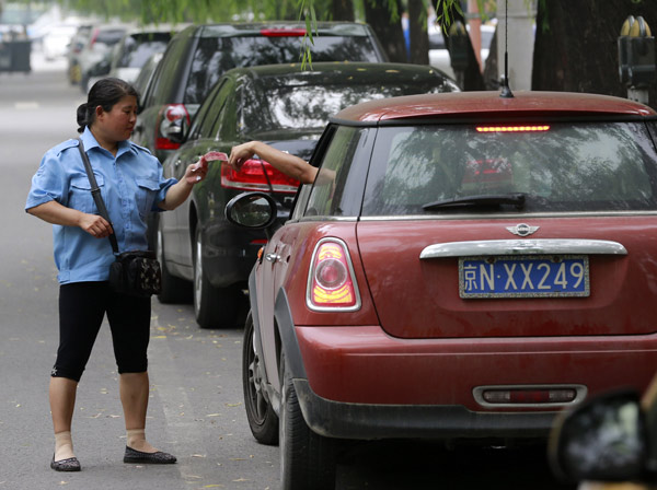 Construction of parking lots still in slow lane