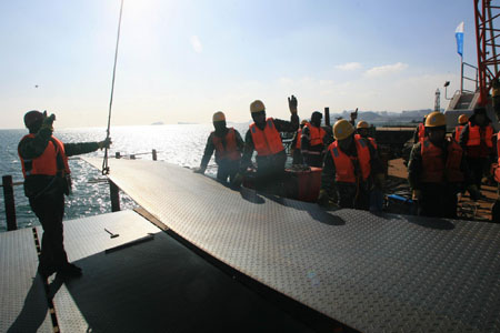 China's first anchored suspension bridge starts offshore construction