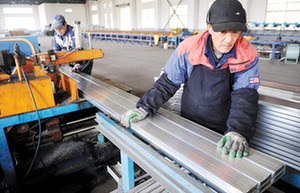 China's manufacturing weakens, but at slower pace