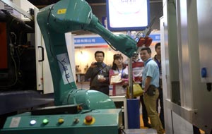 Robots march into China's factories