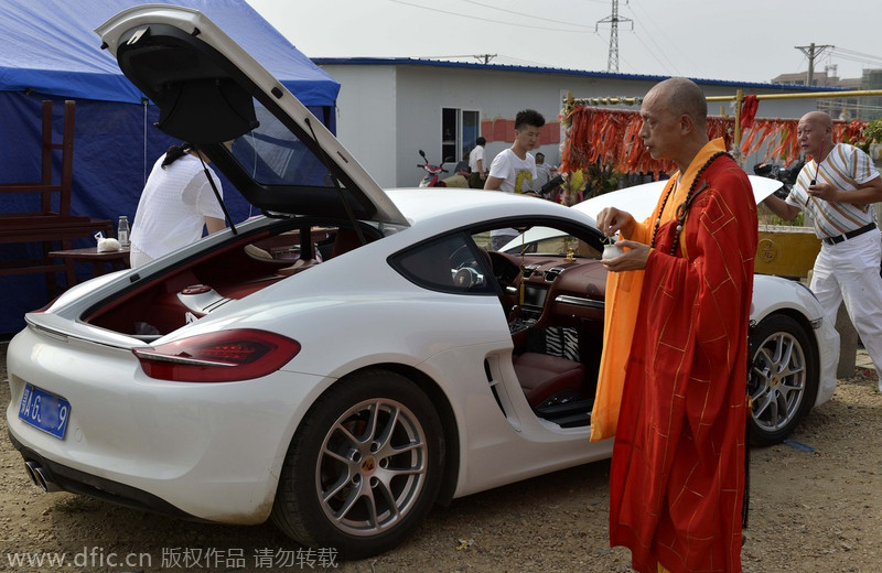 Monks hold consecration event for Porsche sports car