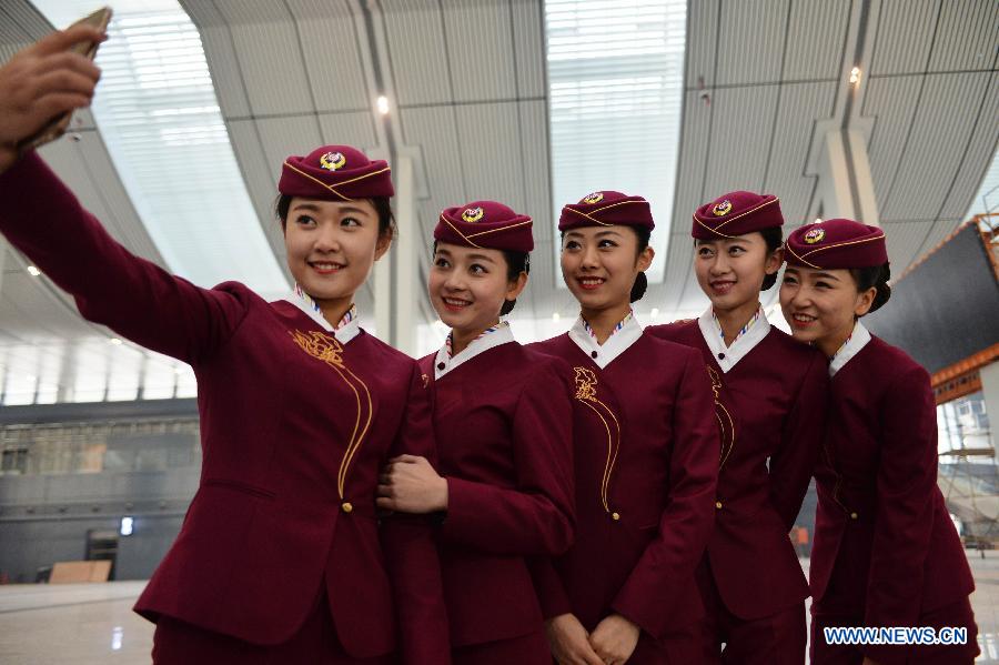 Railway Station's staff members show new suit in Lanzhou