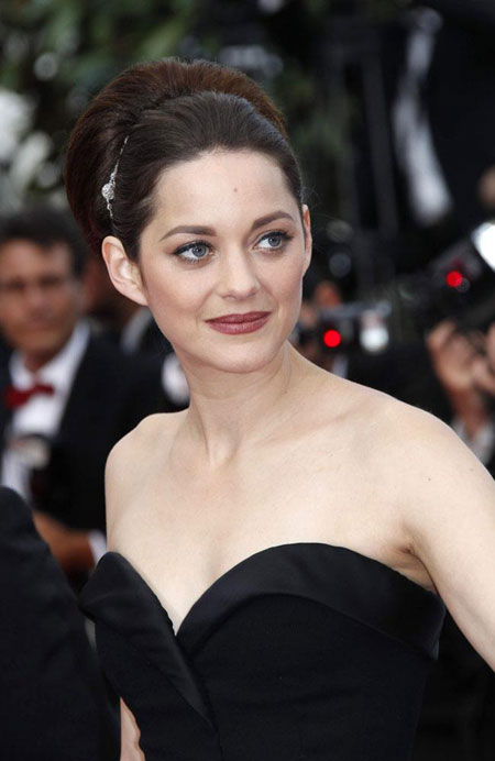 Marion Cotillard finds motherhood exhausting