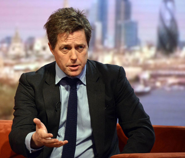 Hugh Grant settles hack claim with Murdoch paper