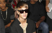 Justin Bieber's bodyguard threatened to kill?