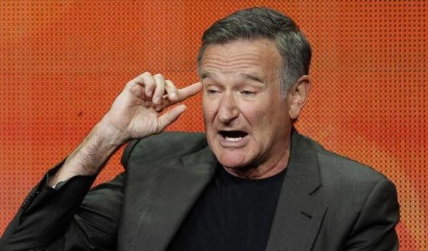 Comedy great Robin Williams hanged himself at home