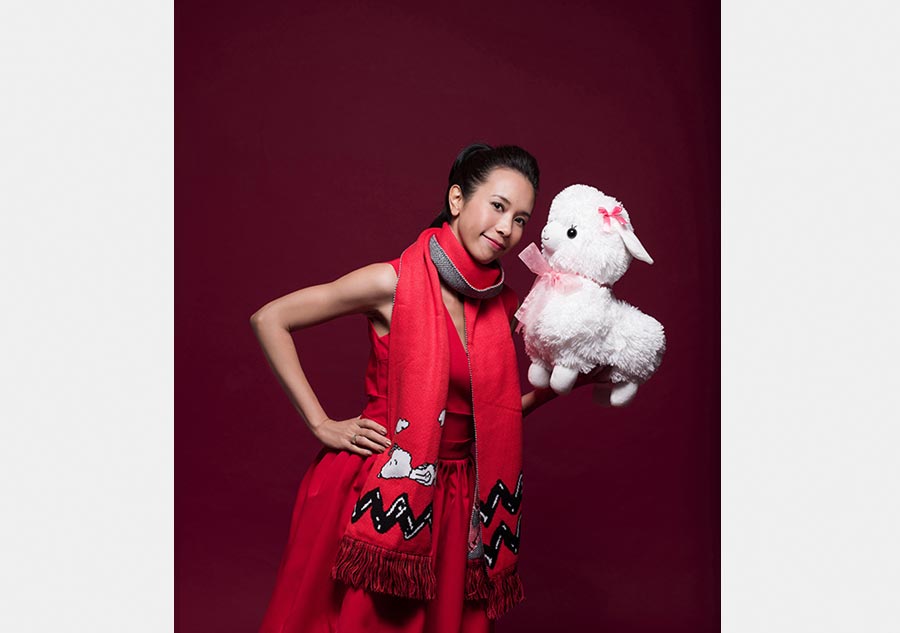 Karen Mok poses for New Year photos