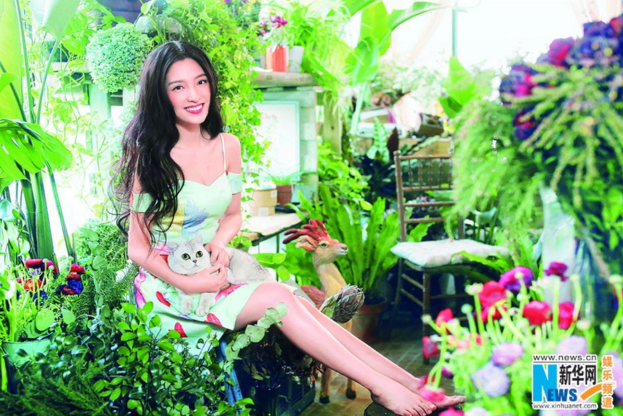 Pan Chen poses for <EM>Cat Fans</EM> magazine