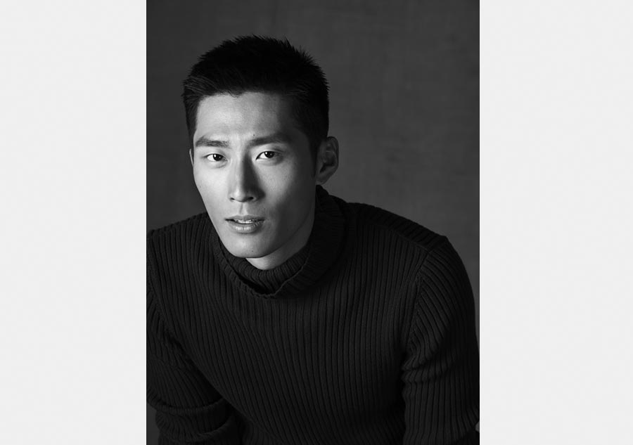 Actor Dou Xiao in black and white