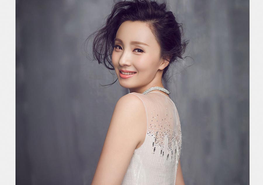 Tao Hong poses for nostalgic photos