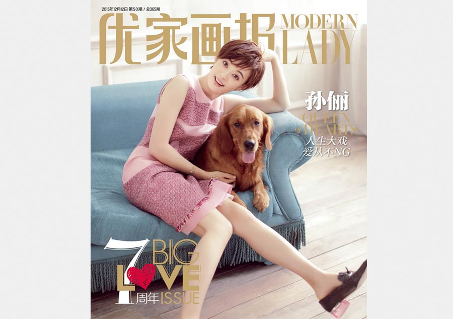 Sun Li poses with dogs for fashion magazine