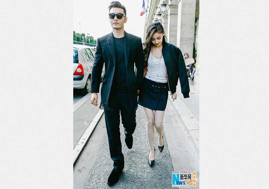 Huang Xiaoming and Angelababy spotted in Paris