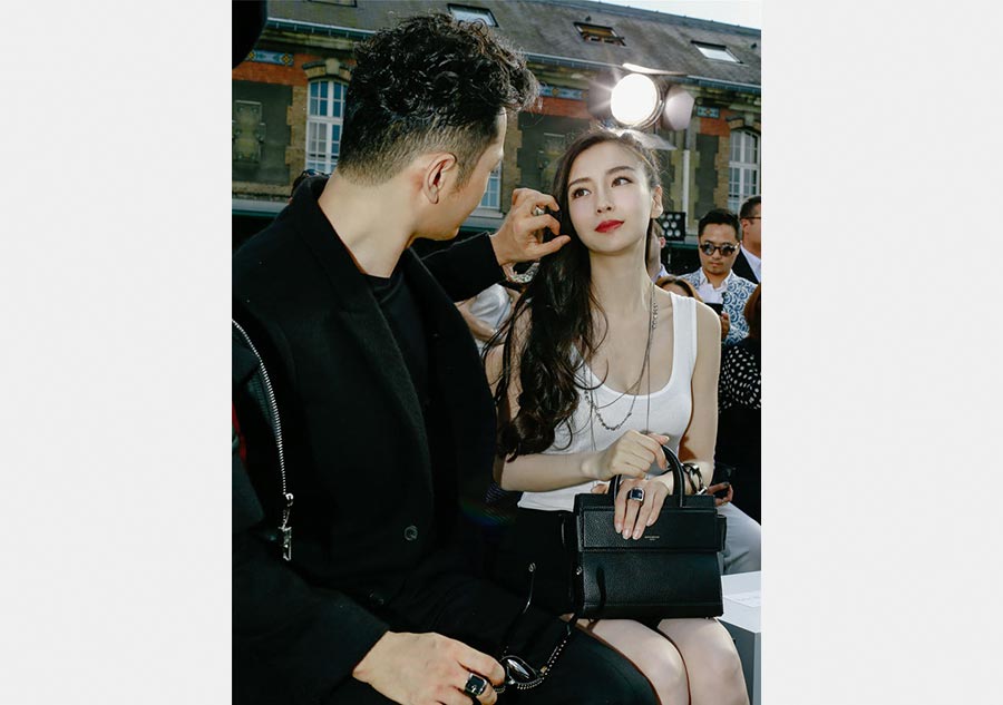 Huang Xiaoming and Angelababy spotted in Paris