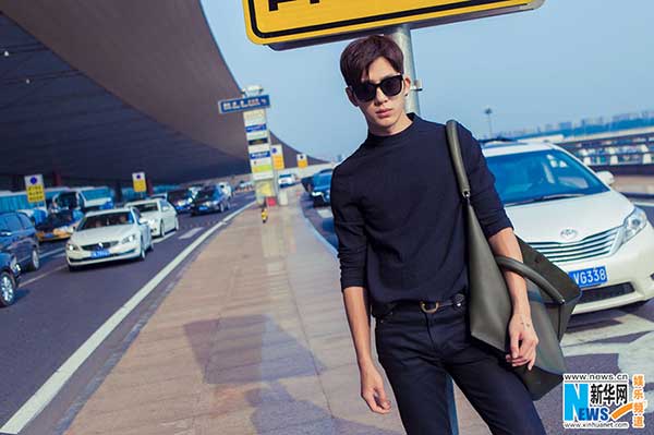 Actor Jing Boran poses in all-black