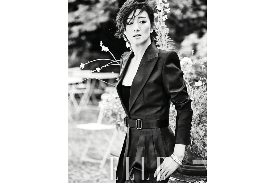 Chinese actress Gong Li poses for fashion magazine