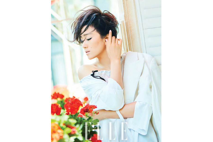 Chinese actress Gong Li poses for fashion magazine