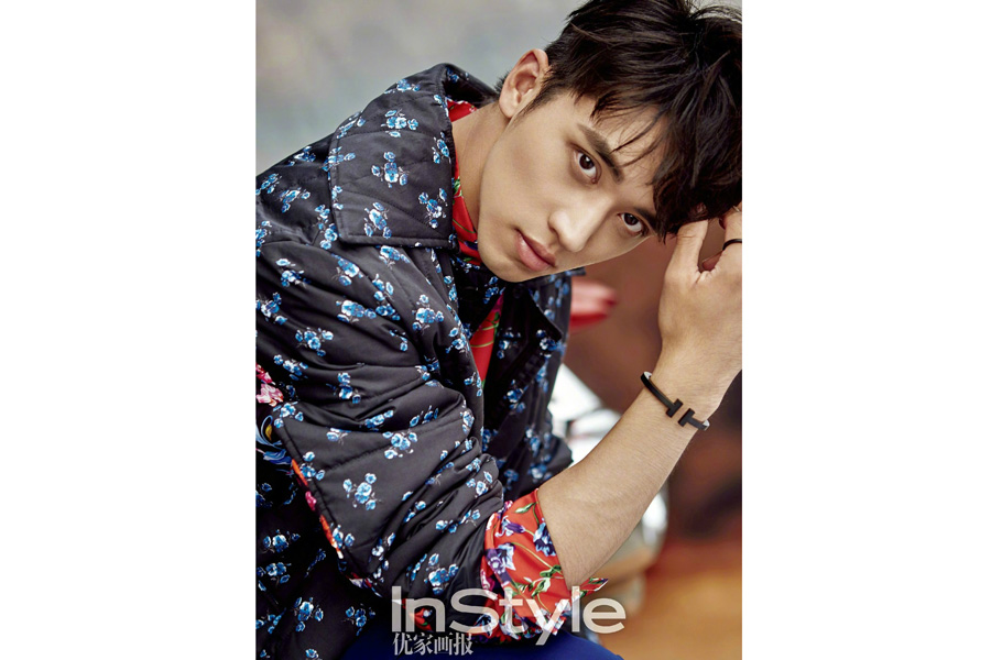 Actor Xu Weizhou poses for fashion magazine