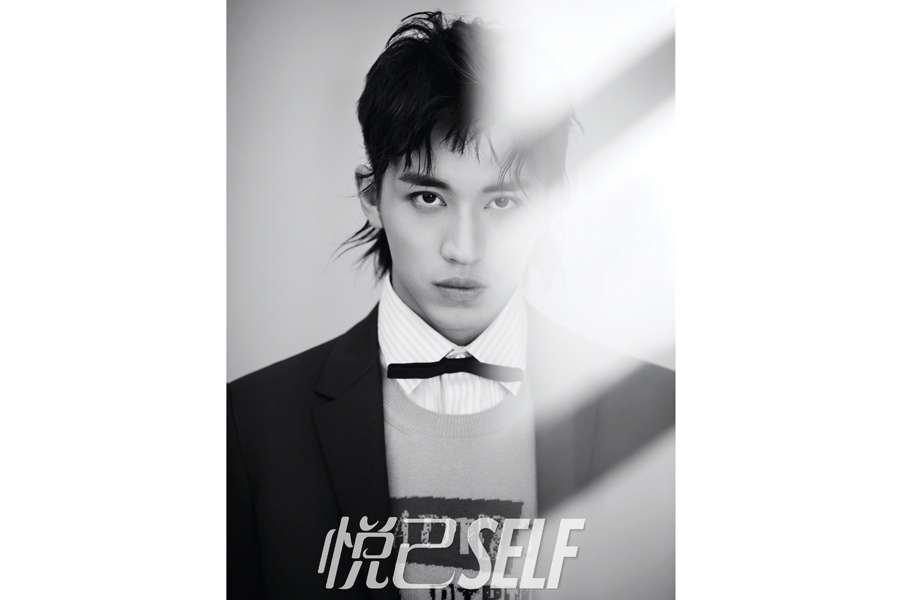 Actor Xu Weizhou poses for fashion magazine