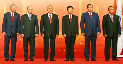 (From L-R) Uzbekistan's President Islom Karimov, Russia's President Vladimir Putin, Kazakhstan's President Nursultan Nazarbayev, China's President Hu Jintao, Tajikistan's President Imomali Rakhmonov and Kyrgyzstan's President Kurmanbek Bakiyev pose during a group photo session at a summit of the Shanghai Cooperation Organization (SCO) in Shanghai June 15, 2006.