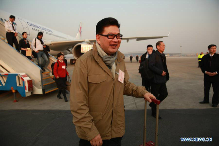 Deputies to 12th NPC arrive in Beijing