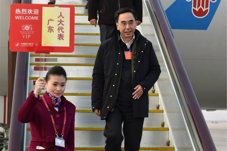 Deputies to 12th NPC arrive in Beijing