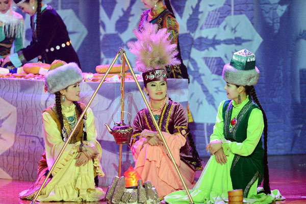 Actors perform Snowland Families in Xinjiang