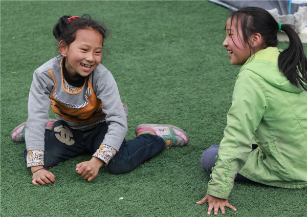 Child's smile soothes quake horror