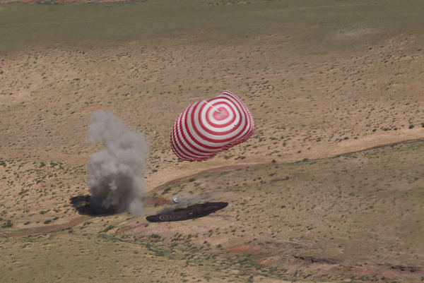 Shenzhou IX return capsule touches down