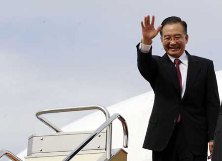 Chinese Premier Wen Jiabao waves upon his arrival for a trilateral meeting between leaders of China, Japan and South Korea at the airport of Fukuoka, Japan, Dec. 13, 2008. Chinese Premier Wen Jiabao waves upon his arrival for a trilateral meeting between leaders of China, Japan and South Korea at the airport of Fukuoka, Japan, Dec. 13, 2008. Chinese Premier Wen Jiabao waves upon his arrival for a trilateral meeting between leaders of China, Japan and South Korea at the airport of Fukuoka, Japan, Dec. 13, 2008. Chinese Premier Wen Jiabao waves upon his arrival for a trilateral meeting between leaders of China, Japan and South Korea at the airport of Fukuoka, Japan, Dec. 13, 2008. Chinese Premier Wen Jiabao waves upon his arrival for a trilateral meeting between leaders of China, Japan and South Korea at the airport of Fukuoka, Japan, Dec. 13, 2008. Chinese Premier Wen Jiabao waves upon his arrival for a trilateral meeting between leaders of China, Japan and South Korea at the airport of Fukuoka, Japan, Dec. 13, 2008. Chinese Premier Wen Jiabao waves upon his arrival for a trilateral meeting between leaders of China, Japan and South Korea at the airport of Fukuoka, Japan, Dec. 13, 2008. 