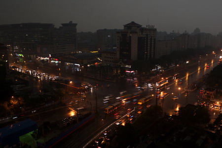 Darkness at noon: Beijing hit by thunderstorm