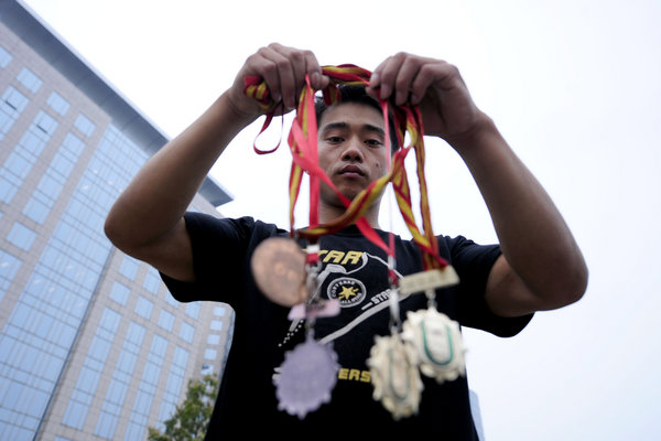 Gymnast down on his luck ends up on the street