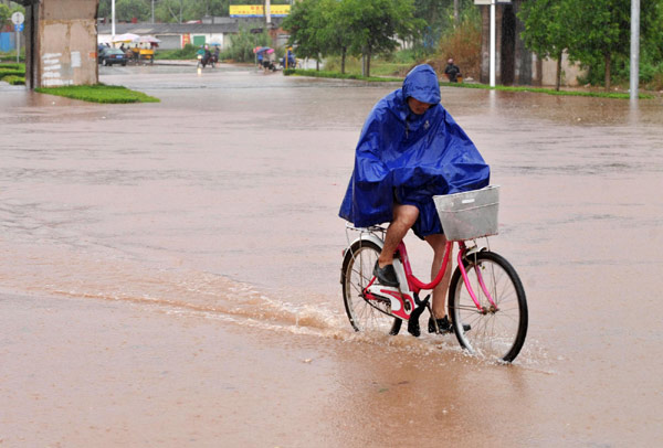 Typhoon-triggered floods kill at least 4