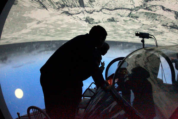 Flight simulators give pilots real training