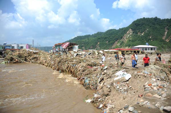 Floods in Liaoning leave 54 dead