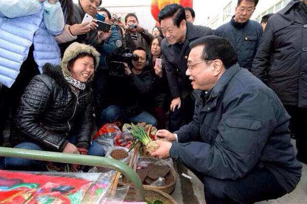 Li visits isolated county in NW China