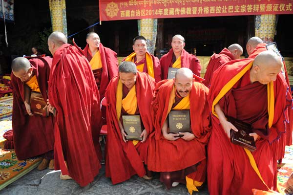 10 monks pass highest Tibetan Buddhism exam