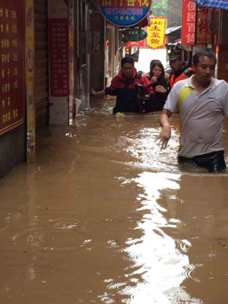 50,000 evacuated in Central China downpours