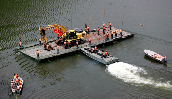 Blast 1st step to discharge lake formed after tremor