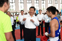 Chinese President Xi meets IOC chief Bach