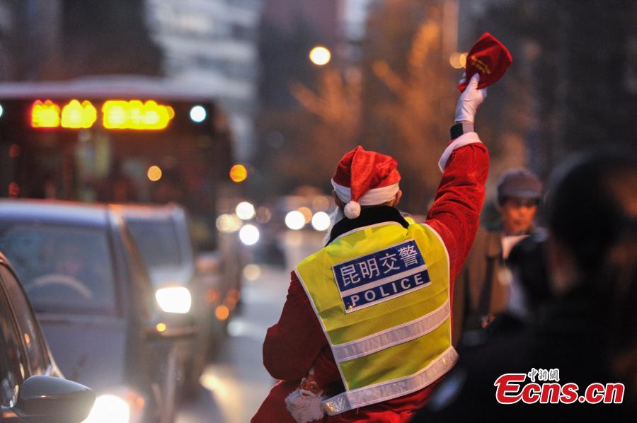 Santa traffic policemen add festivity to the streets