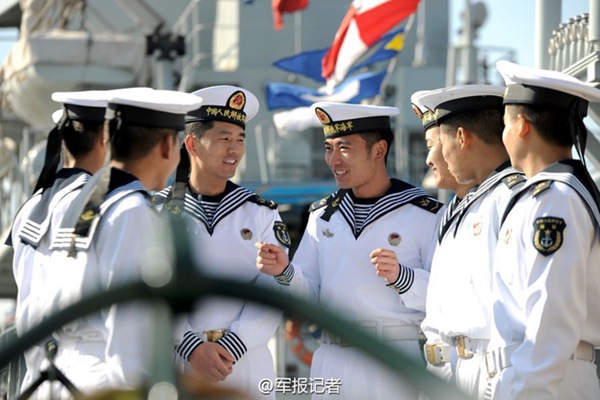 Chinese navy soldiers put on new uniform