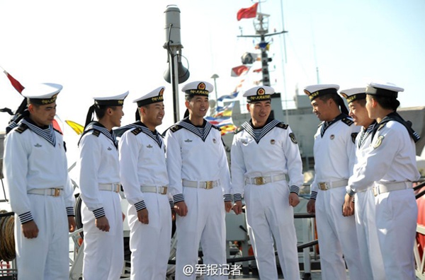 Chinese navy soldiers put on new uniform