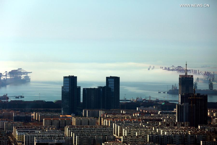 Buildings covered by fog in China's Qingdao