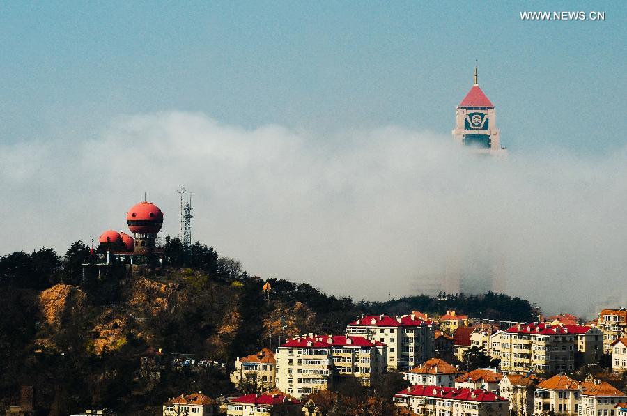 Buildings covered by fog in China's Qingdao