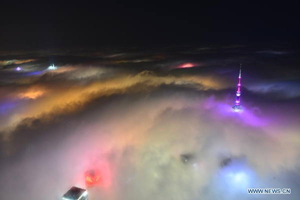 Magnificent scene: buildings amid heavy fog in Shanghai