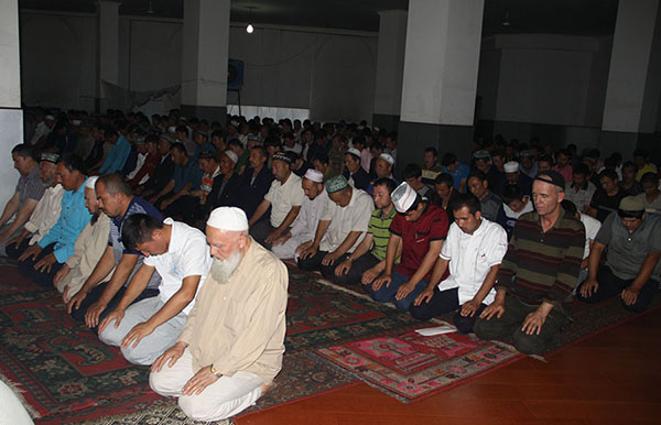 Muslims attend a prayer in Xinjiang