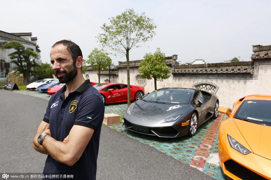 High-end sports cars rally in ancient town