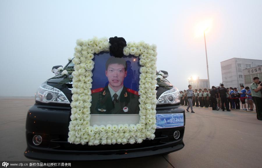 Remains of Chinese guard killed in Somalia attack return home